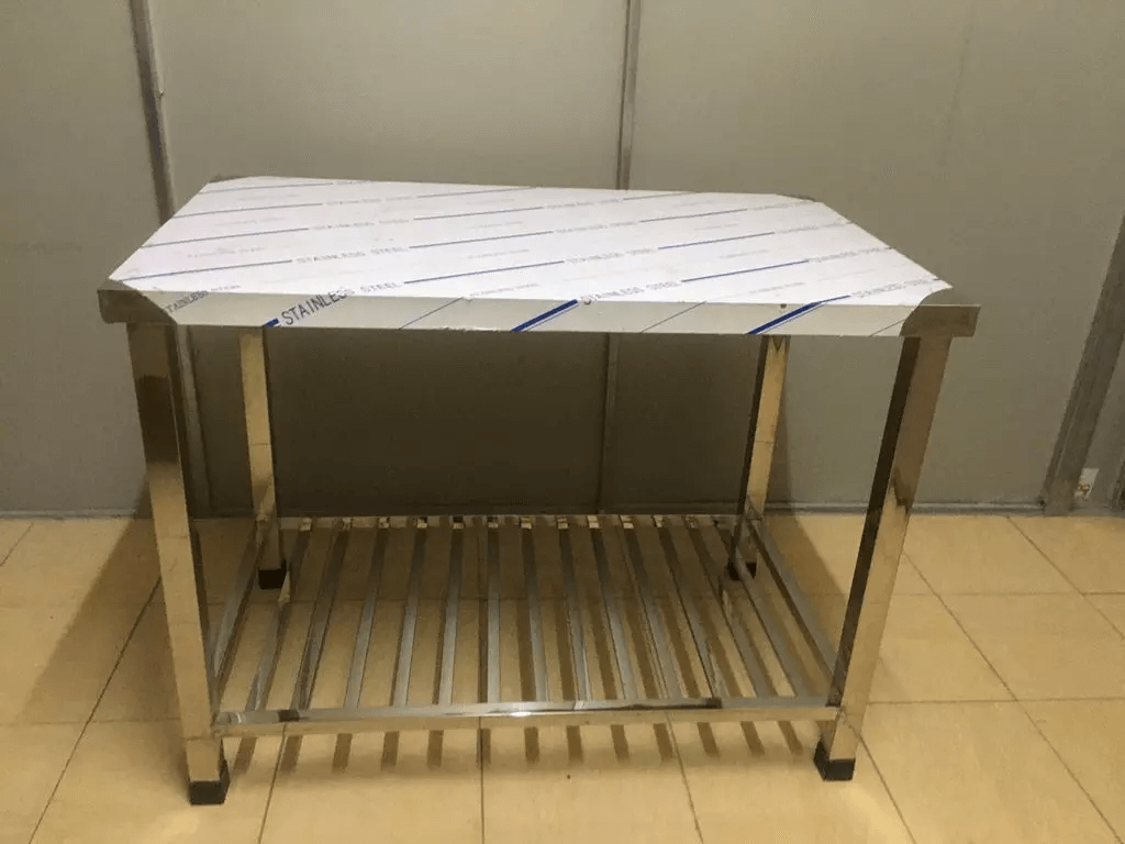 Bàn chặt inox 100 x 60cm ( có lót gỗ ) 001